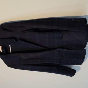 Vintage like new. 2 pockets. One button closure.  Faux Buttons on sleeve